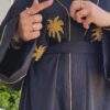 Black Abaya With Golden Palm Design On Chest And Stitched Hat And Belt